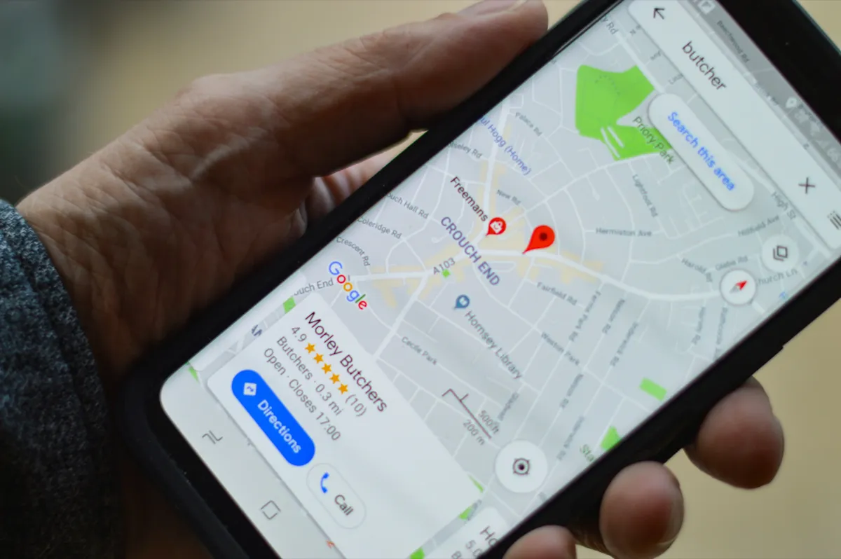 Person searching for local business on their phone